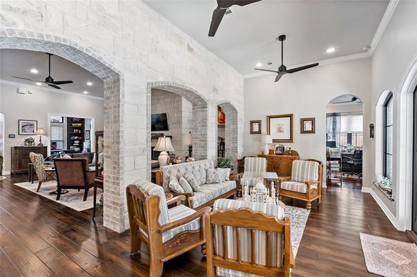 Fireplace, Interior, Living room, Recessed Lighting, Stone Walls, Wood Texture Flooring