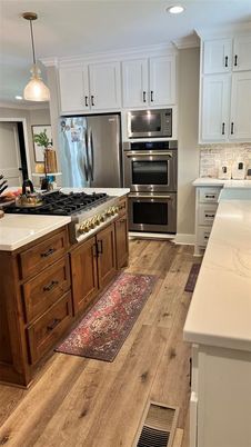 Interior, Kitchen, Pendant Lights, Recessed Lighting, Stainless Steel Appliances, Wood Texture Flooring