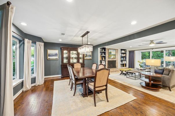 Chandelier, Dining room, Fireplace, Interior, Living room, Recessed Lighting, Wood Texture Flooring