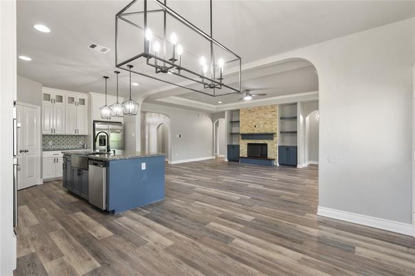 Chandelier, Fireplace, Interior, Kitchen, Pendant Lights, Recessed Lighting, Wood Texture Flooring