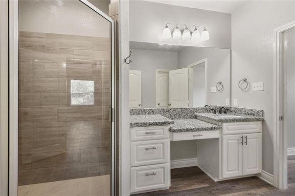 Bathroom, Dual Sink Vanities, Glass Shower, Interior, Wood Texture Flooring