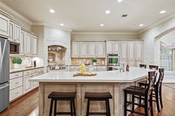 Interior, Kitchen, Recessed Lighting, Stainless Steel Appliances, Stone Walls, Wood Texture Flooring