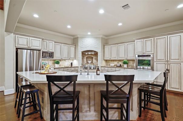 Interior, Kitchen, Recessed Lighting, Stainless Steel Appliances, Stone Walls, Wood Texture Flooring