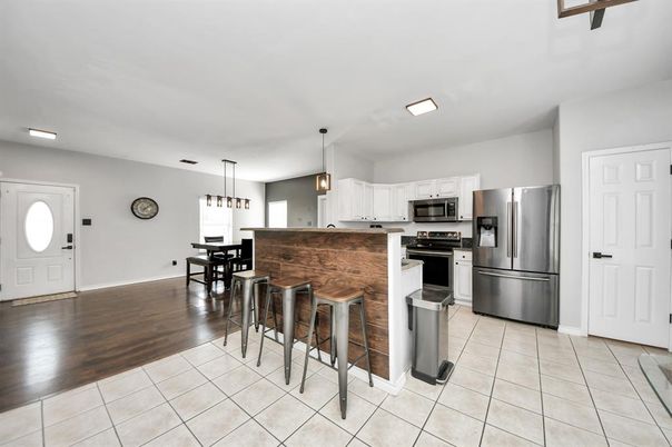 Dining room, Interior, Kitchen, Pendant Lights, Stainless Steel Appliances, Wood Texture Flooring