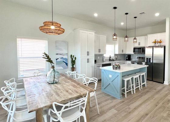 Dining room, Interior, Kitchen, Pendant Lights, Recessed Lighting, Stainless Steel Appliances, Wood Texture Flooring