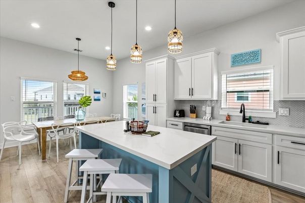 Dining room, Interior, Kitchen, Pendant Lights, Recessed Lighting, Stainless Steel Appliances, Wood Texture Flooring