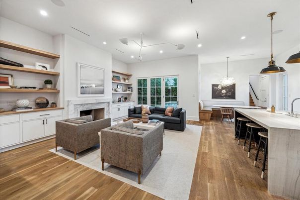 Dining room, Fireplace, Interior, Living room, Pendant Lights, Recessed Lighting, Wood Texture Flooring
