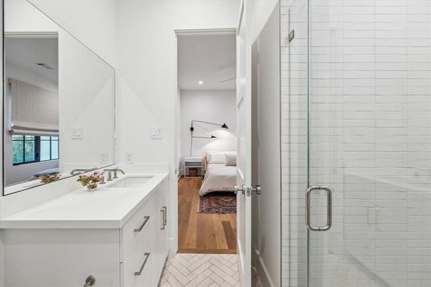 Bathroom, Bedroom, Dual Sink Vanities, Glass Shower, Interior, Recessed Lighting, Wood Texture Flooring