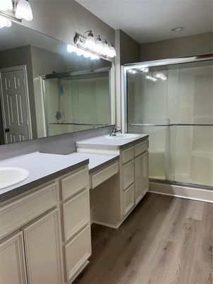 Bathroom, Dual Sink Vanities, Glass Shower, Interior, Wood Texture Flooring