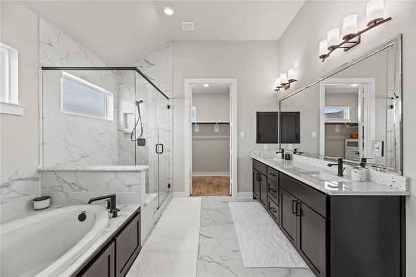 Bathroom, Dual Sink Vanities, Glass Shower, Interior, Marble, Marble Walls, Recessed Lighting