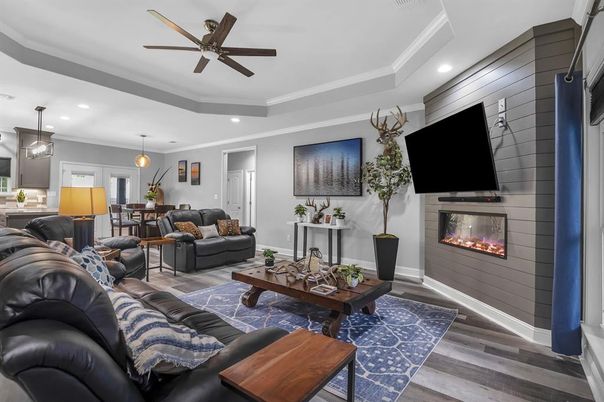 Dining room, Fireplace, Interior, Living room, Pendant Lights, Recessed Lighting, Wood Texture Flooring