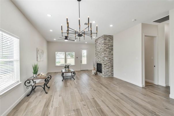 Fireplace, Interior, Pendant Lights, Recessed Lighting, Wood Texture Flooring