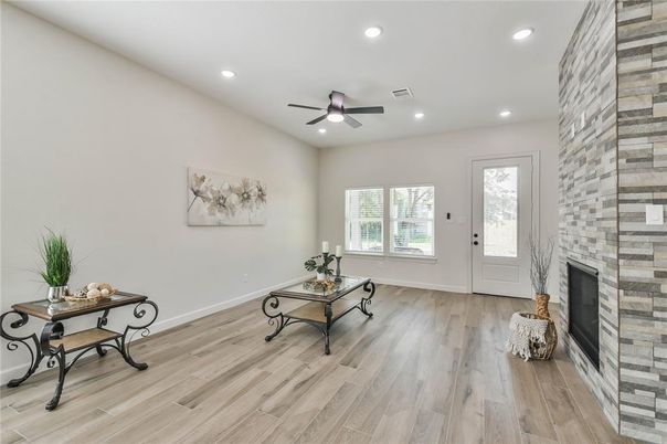 Fireplace, Interior, Recessed Lighting, Stone Walls, Wood Texture Flooring
