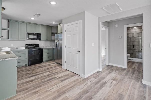 Interior, Kitchen, Recessed Lighting, Stainless Steel Appliances, Wood Texture Flooring