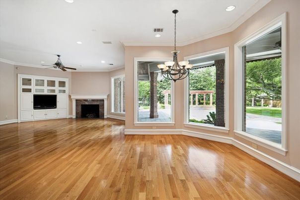 Chandelier, Empty room, Fireplace, Interior, Recessed Lighting, Wood Texture Flooring