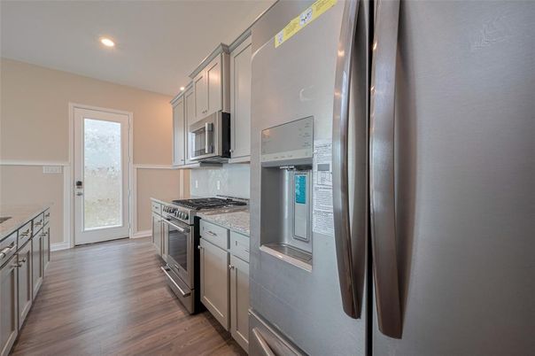 Interior, Kitchen, Recessed Lighting, Stainless Steel Appliances, Wood Texture Flooring