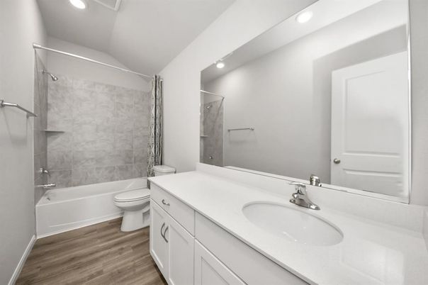 Bathroom, Dual Sink Vanities, Interior, Recessed Lighting, Wood Texture Flooring