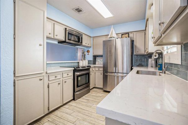 Interior, Kitchen, Recessed Lighting, Stainless Steel Appliances, Wood Texture Flooring