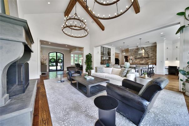 Chandelier, Dining room, Fireplace, Interior, Kitchen, Living room, Pendant Lights, Recessed Lighting, Stone Walls, Wooden Beams, Wood Texture Flooring