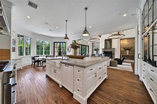 Chandelier, Dining room, Fireplace, Interior, Kitchen, Living room, Pendant Lights, Recessed Lighting, Wood Texture Flooring