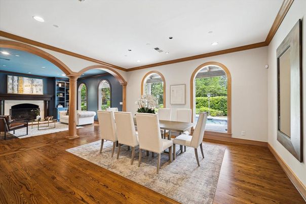Dining room, Fireplace, Interior, Living room, Recessed Lighting, Wood Texture Flooring