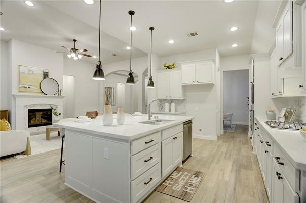 Fireplace, Interior, Kitchen, Pendant Lights, Recessed Lighting, Stainless Steel Appliances, Wood Texture Flooring