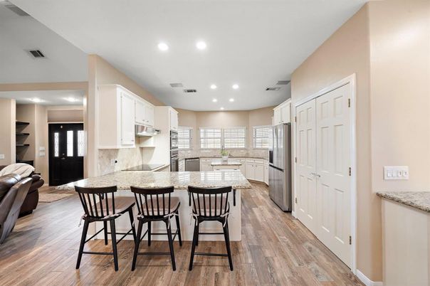 Interior, Kitchen, Recessed Lighting, Stainless Steel Appliances, Wood Texture Flooring