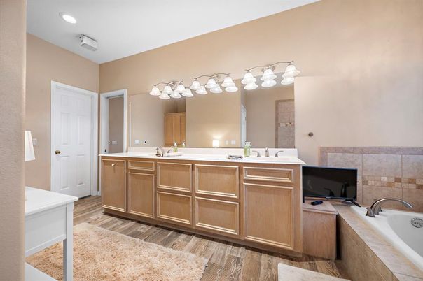 Bathroom, Dual Sink Vanities, Interior, Recessed Lighting, Wood Texture Flooring