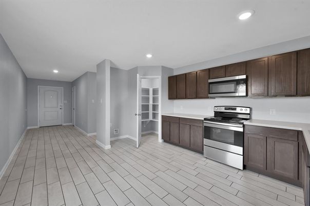 Interior, Kitchen, Recessed Lighting, Stainless Steel Appliances, Wood Texture Flooring