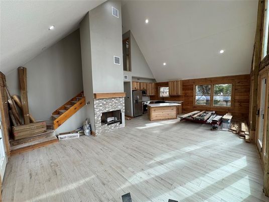 Fireplace, Interior, Kitchen, Recessed Lighting, Wood Texture Flooring, Wooden Walls