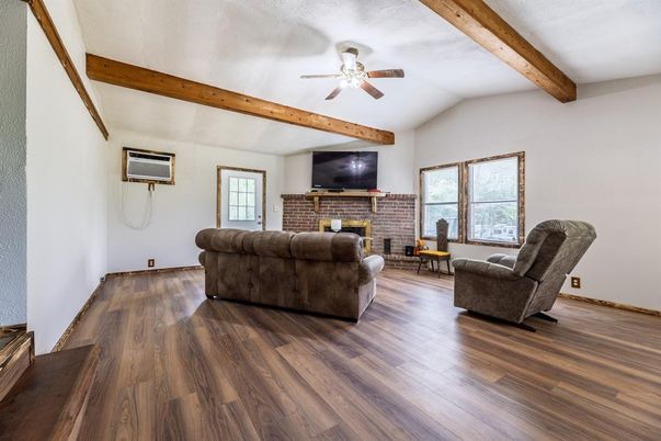Fireplace, Interior, Living room, Stone Walls, Wooden Beams, Wood Texture Flooring