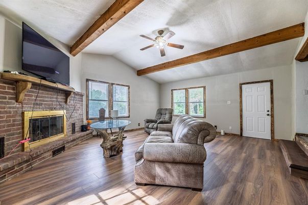 Fireplace, Interior, Living room, Stone Walls, Wooden Beams, Wood Texture Flooring