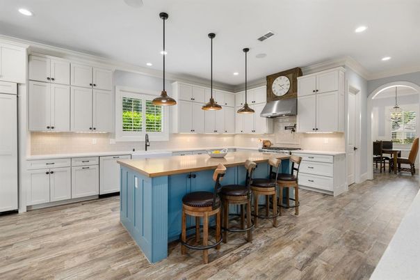 Dining room, Interior, Kitchen, Pendant Lights, Recessed Lighting, Stainless Steel Appliances, Wood Texture Flooring