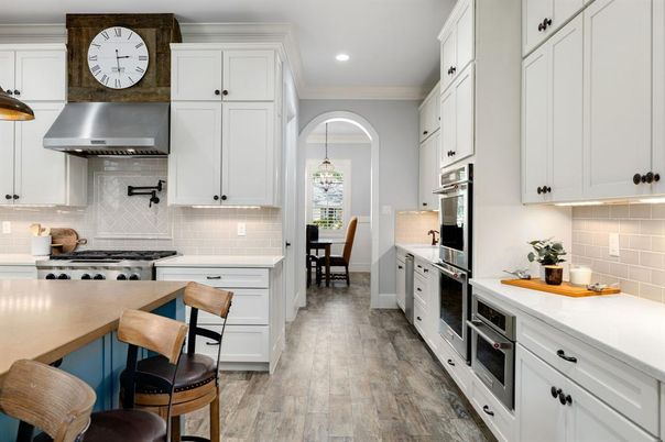 Dining room, Interior, Kitchen, Pendant Lights, Recessed Lighting, Stainless Steel Appliances, Wood Texture Flooring
