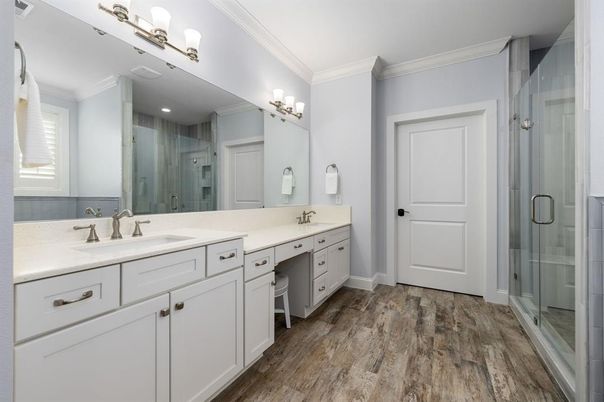 Bathroom, Dual Sink Vanities, Glass Shower, Interior, Recessed Lighting, Wood Texture Flooring
