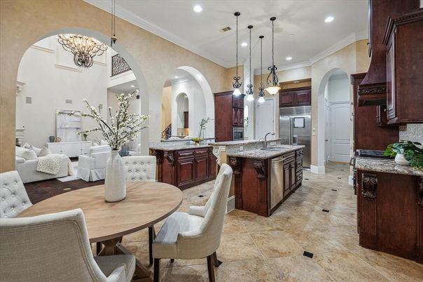 Chandelier, Dining room, Interior, Kitchen, Living room, Pendant Lights, Recessed Lighting, Stainless Steel Appliances