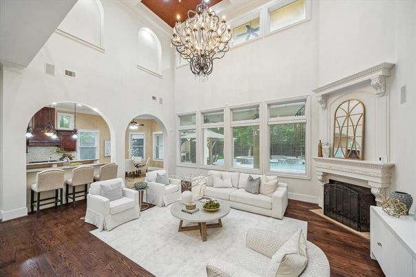 Chandelier, Dining room, Fireplace, Interior, Kitchen, Living room, Recessed Lighting, Wood Texture Flooring