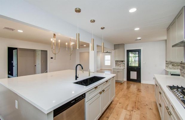 Chandelier, Interior, Kitchen, Pendant Lights, Recessed Lighting, Stainless Steel Appliances, Wood Texture Flooring