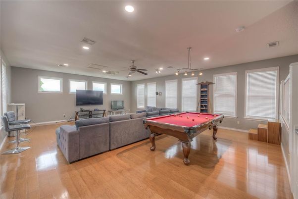 Billiard Table, Game Room, Interior, Living room, Pendant Lights, Recessed Lighting, Wood Texture Flooring