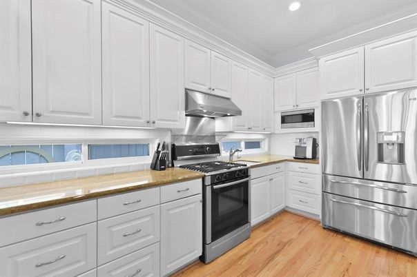 Interior, Kitchen, Recessed Lighting, Stainless Steel Appliances, Wood Texture Flooring