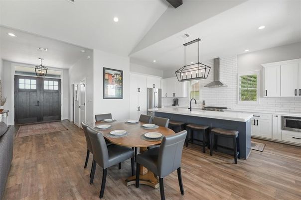 Dining room, Interior, Kitchen, Pendant Lights, Recessed Lighting, Stainless Steel Appliances, Wood Texture Flooring