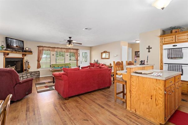 Dining room, Fireplace, Interior, Living room, Wood Texture Flooring