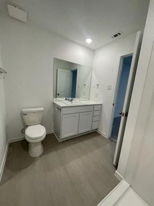 Bathroom, Dual Sink Vanities, Interior, Recessed Lighting, Wood Texture Flooring