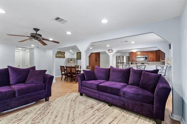 Dining room, Interior, Kitchen, Living room, Recessed Lighting, Stainless Steel Appliances, Wood Texture Flooring