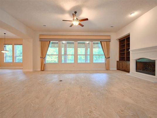 Empty room, Fireplace, Interior, Pendant Lights, Recessed Lighting, Wood Texture Flooring