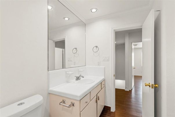 Bathroom, Dual Sink Vanities, Interior, Recessed Lighting, Wood Texture Flooring