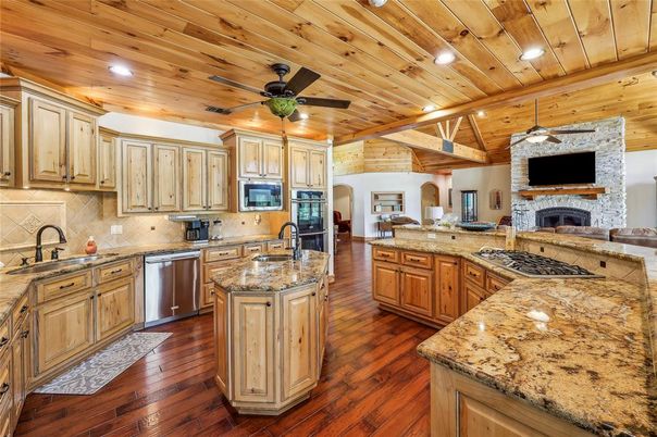 Fireplace, Interior, Kitchen, Recessed Lighting, Stainless Steel Appliances, Stone Walls, Wooden Beams, Wooden Ceilings, Wood Texture Flooring