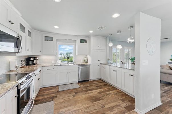 Interior, Kitchen, Pendant Lights, Recessed Lighting, Stainless Steel Appliances, Wood Texture Flooring