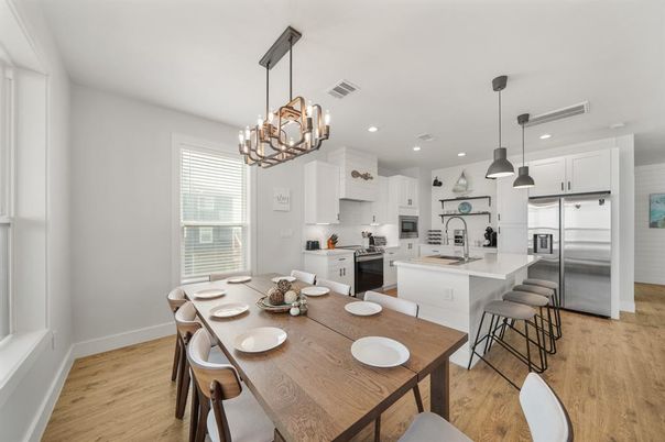 Chandelier, Dining room, Interior, Kitchen, Pendant Lights, Recessed Lighting, Stainless Steel Appliances, Wood Texture Flooring
