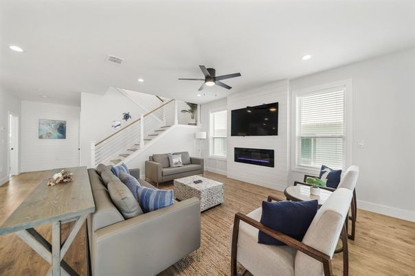 Dining room, Fireplace, Interior, Living room, Recessed Lighting, Wood Texture Flooring